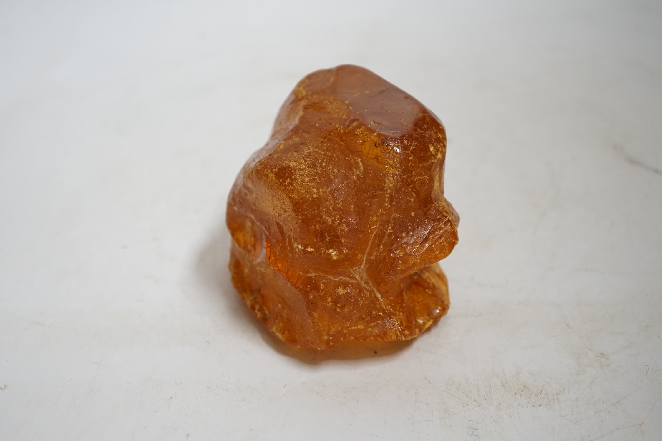 A section of natural amber, approximately 11.5cm wide. Condition - fair